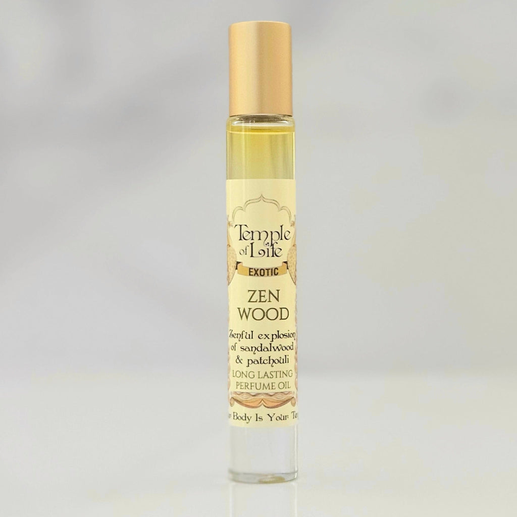 Perfume bottle labeled 'Zen Wood' by Temple of Life on a gray background
