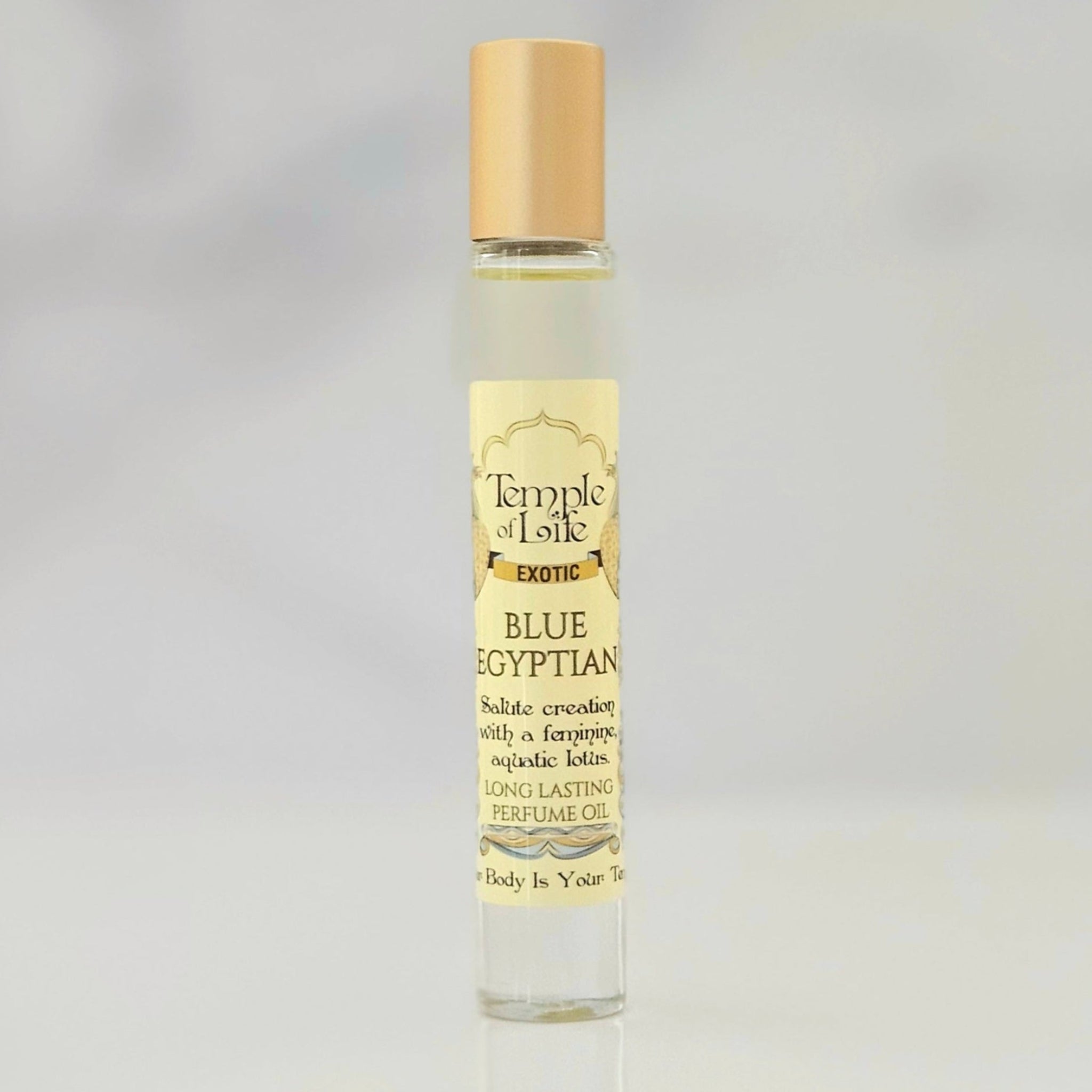 Perfume oil bottle labeled 'Blue Egyptian' by Temple of Life on a gray background