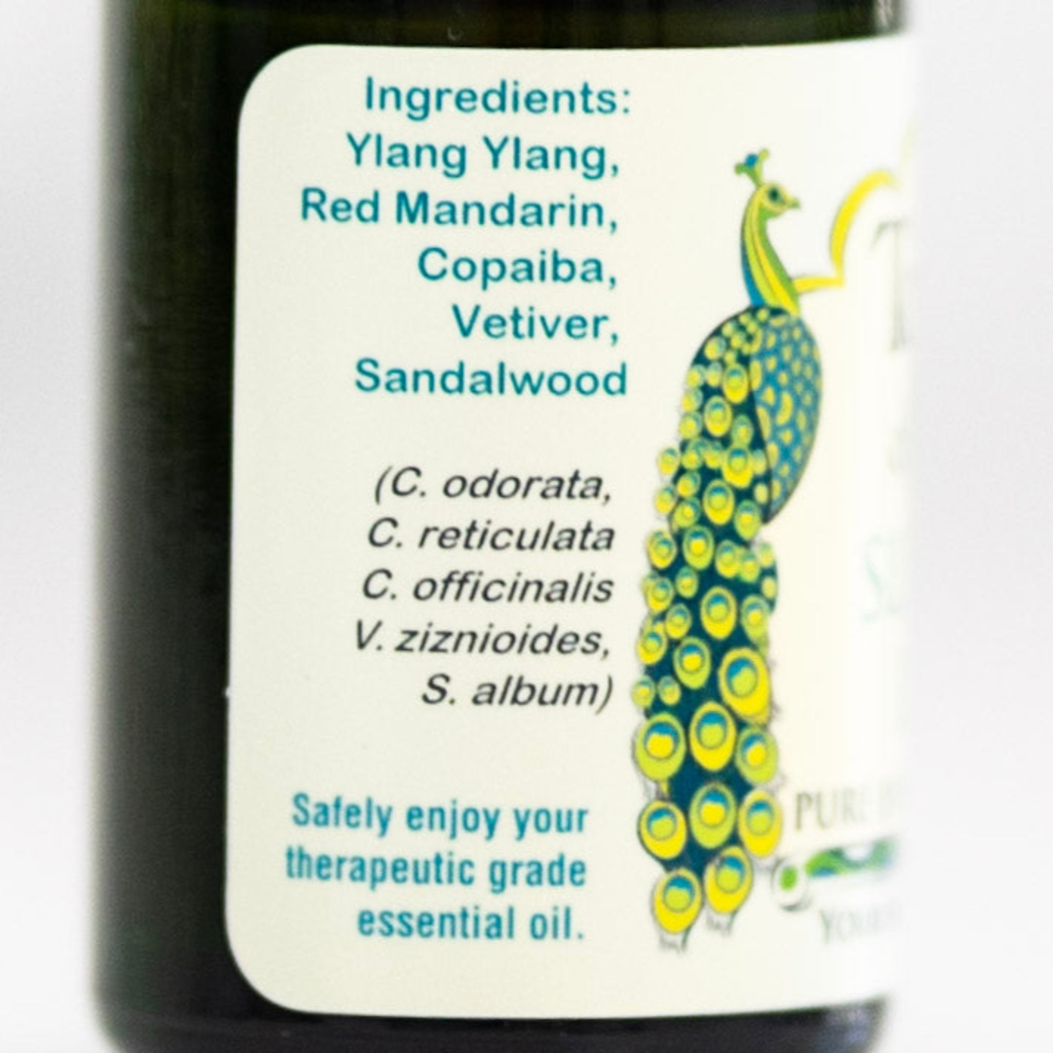 A bottle of Slumber Land essential oil blend for sleep and groundation.
