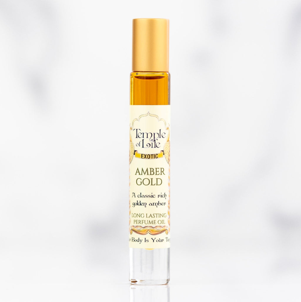 Amber Gold perfume oil bottle on a white background