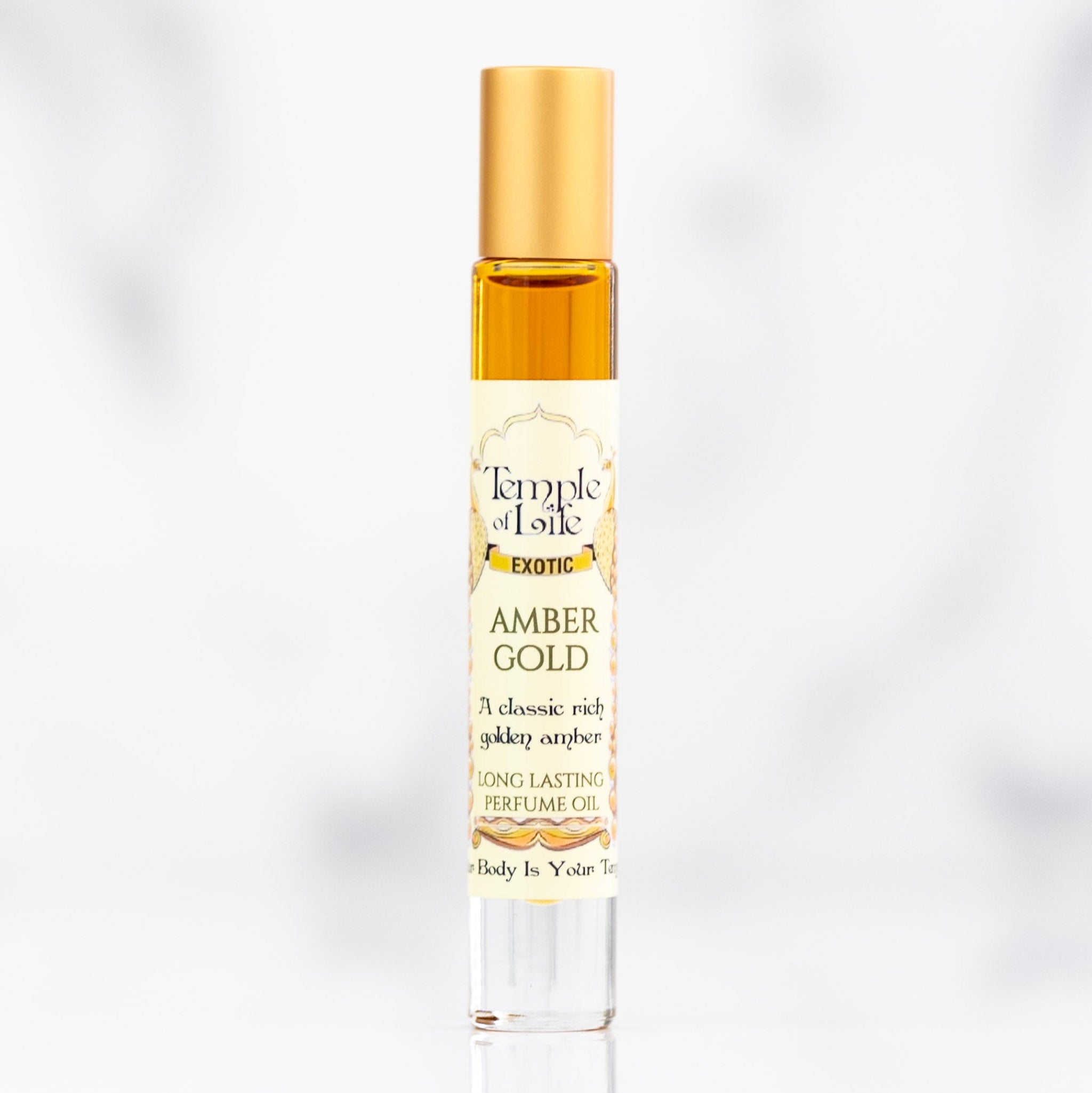 Amber Gold perfume oil bottle on a white background