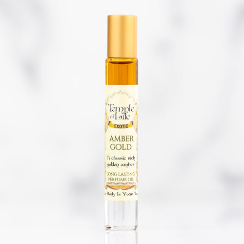Amber Gold perfume oil bottle on a white background