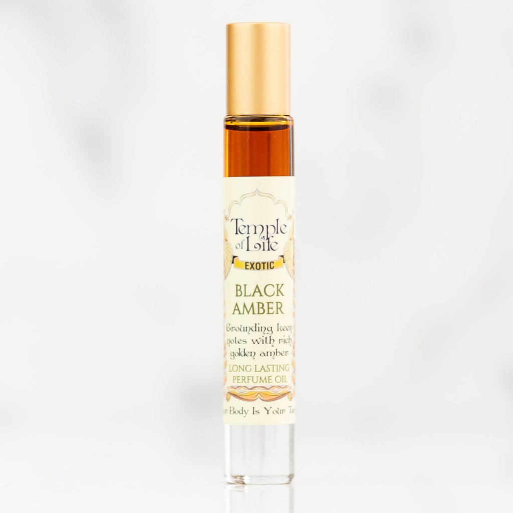 Perfume bottle labeled 'Black Amber' by Temple of Life on a white background