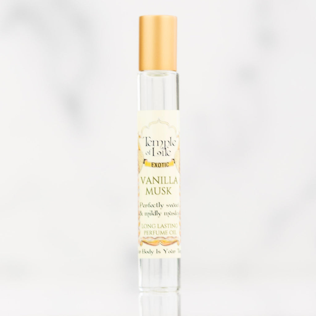 Vanilla Musk perfume bottle with gold cap on a white background