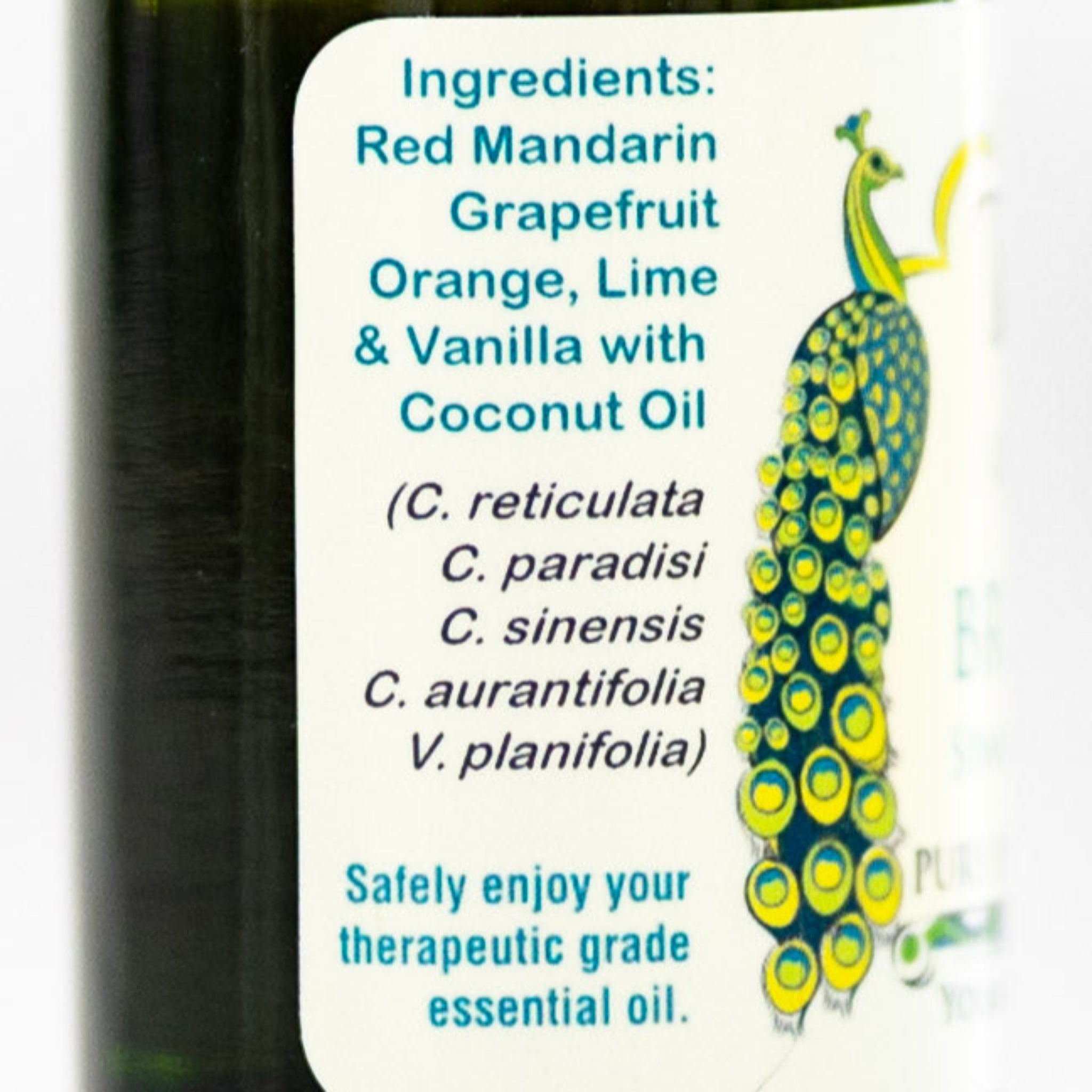 Bottle of Brilliante citrus & vanilla essential oil blend with a label detailing ingredients and safety information.