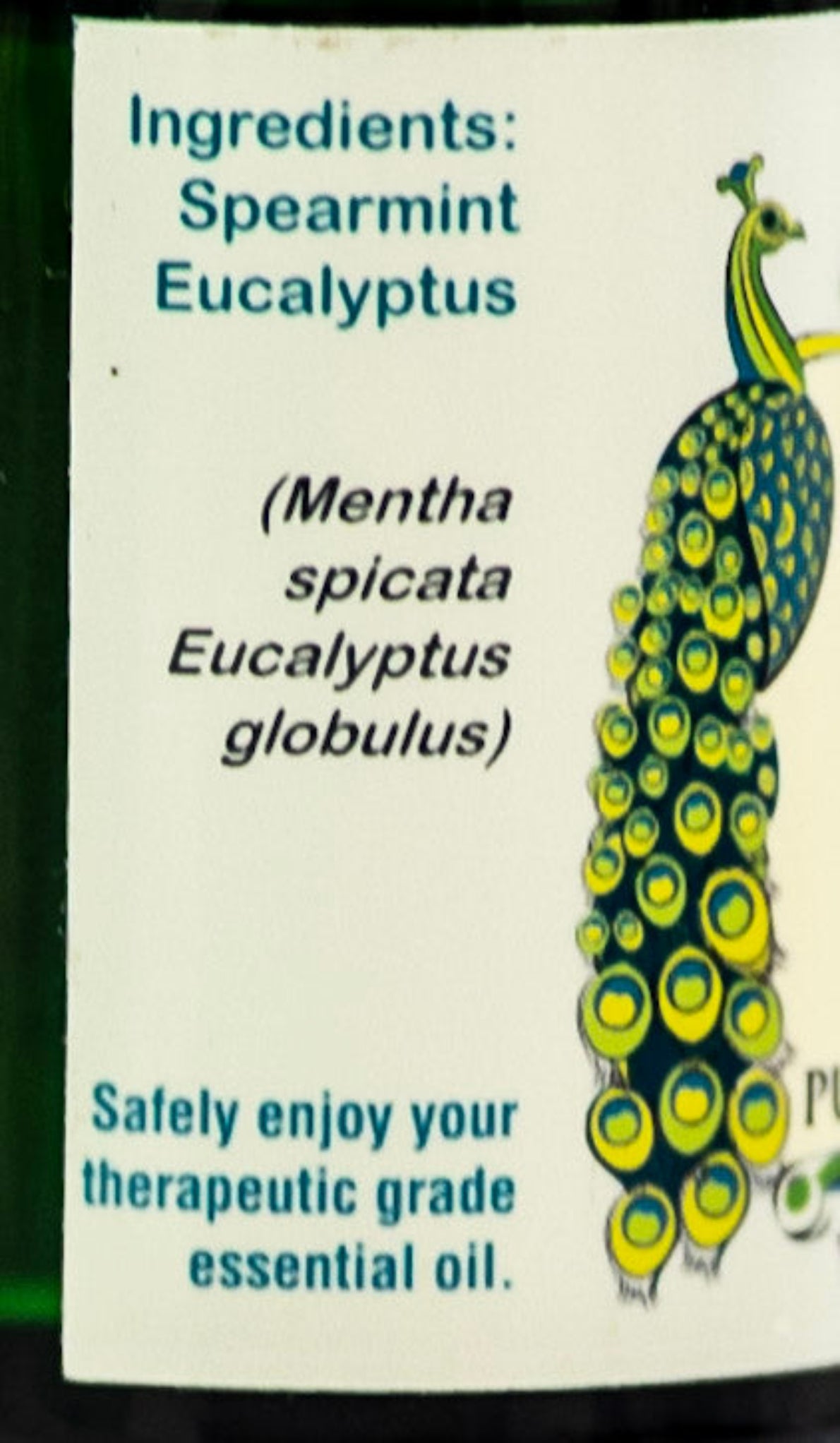 Product label with spearmint and eucalyptus ingredients and a peacock illustration.