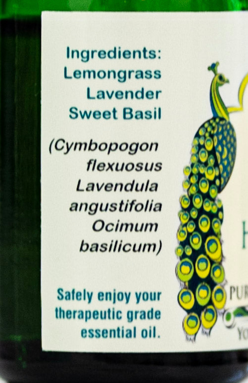 Bottle of Harmony essential oil blend with ingredient label on a white background