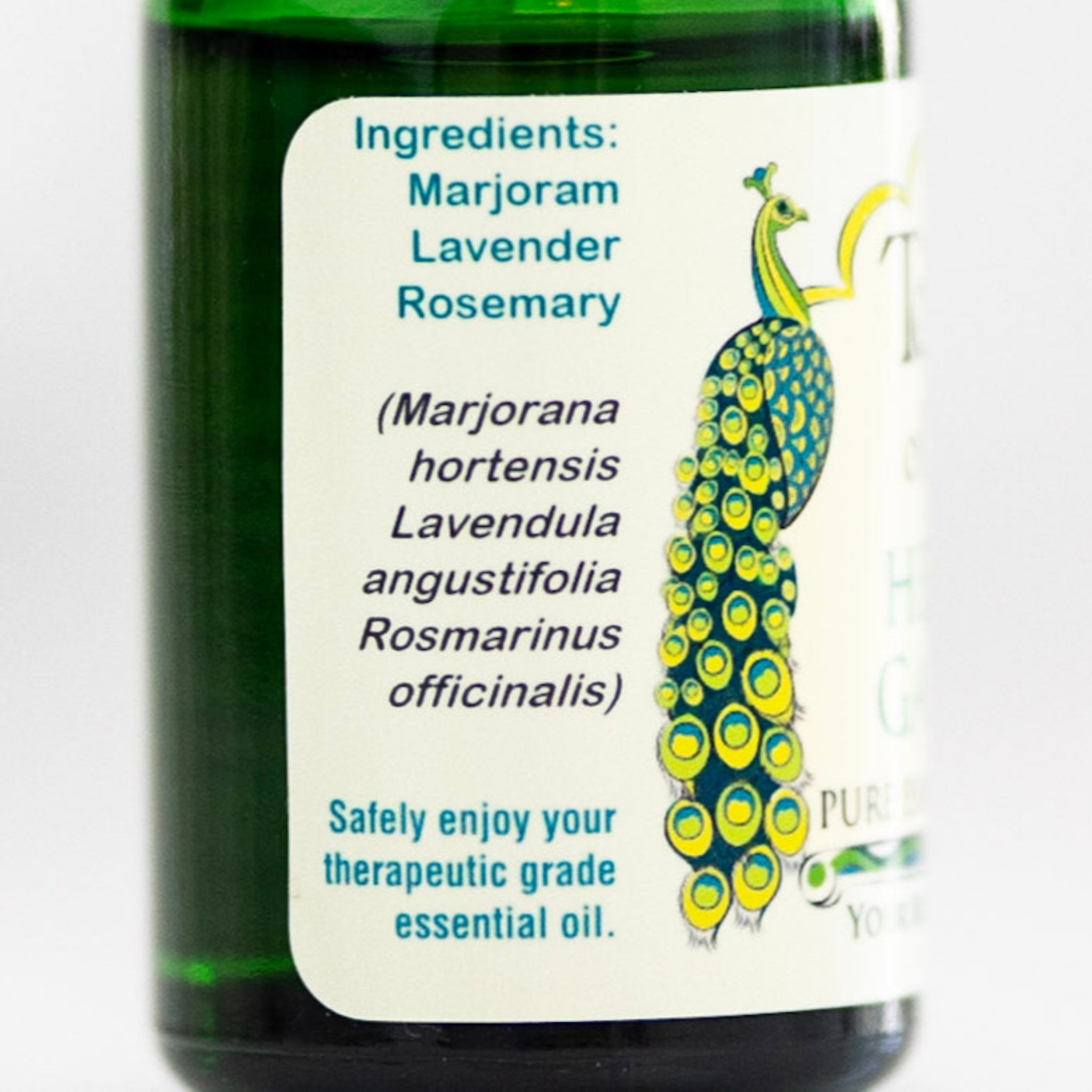 Bottle label with list of ingredients for a relaxing essential oil blend labeled 'Healing Gardens' on a white background.