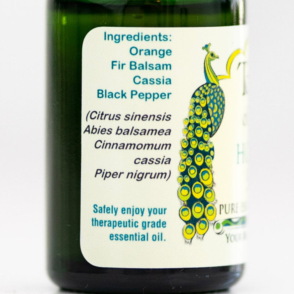 Bottle of Holiday Sexy essential oil with ingredient list.