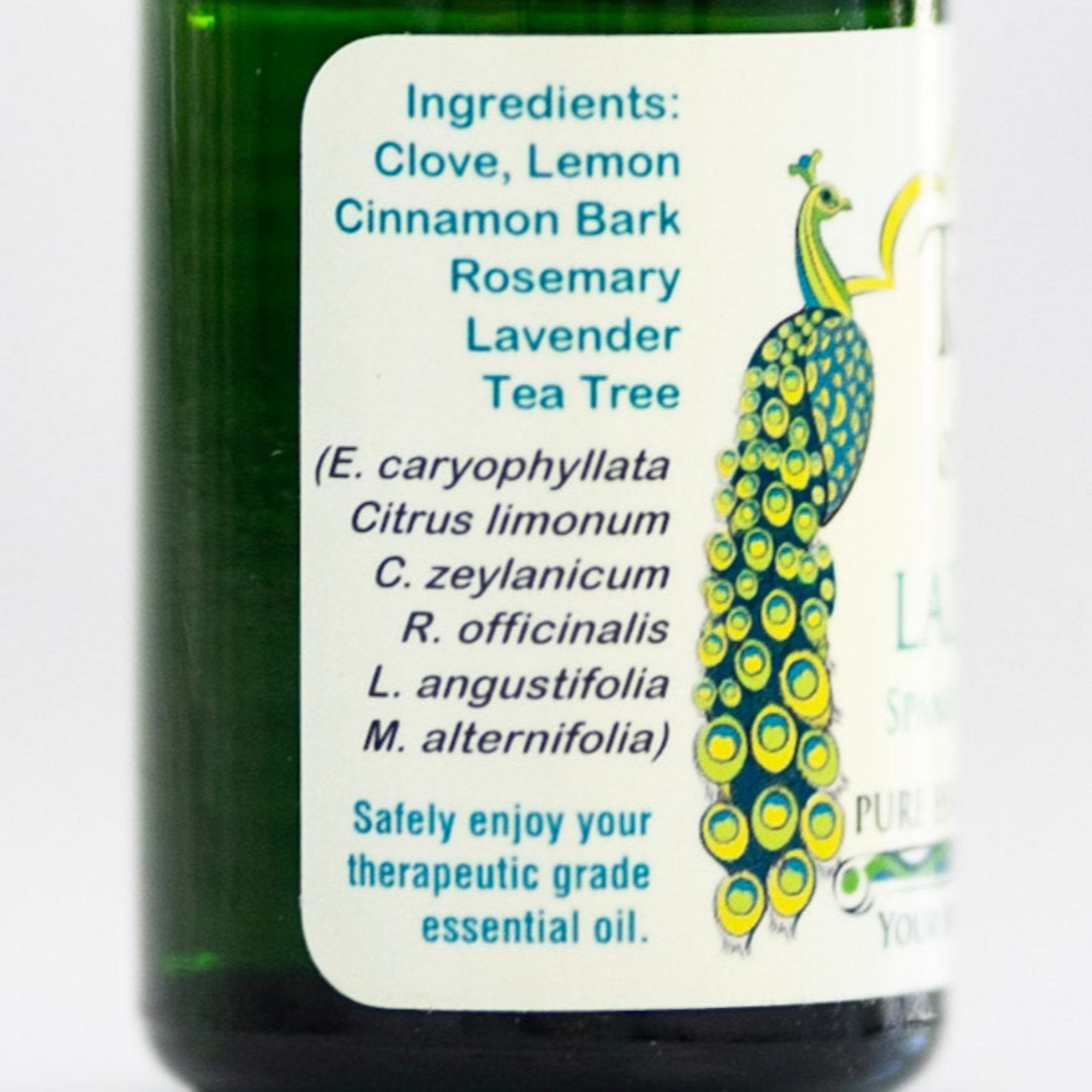 Bottle of essential oil with a label listing ingredients of Ladrones protection oil.